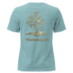 Back view of women’s relaxed-fit T-shirt featuring a gold tree with books among its branches, stars, a crescent moon, and Wordwhispers lettering beneath in heather blue lagoon