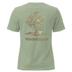 Back view of women’s relaxed-fit T-shirt featuring a gold tree with books among its branches, stars, a crescent moon, and Wordwhispers lettering beneath in sage